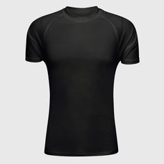 a black t - shirt with short sleeves and a round neckline on a gray background