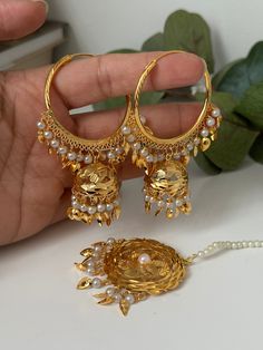 traditional punjabi walliya x tikka. It's lightweight. Suitable for any occasion like wedding, engagement, birthday party or great for gifts.  Style tip- ----------- Pair it with any beautiful traditional outfits  and flaunt with Unique style of collection from us. Perfect match for Festival and Traditional wear.  Take Care Tips-  ---------------- Kee away from perfume, Hair spray and. Moisture.  Store in dry place , Ziplock bag or Airtight box.    Clean with dry cloth.  Jewellery is the last th Gold Plated Chandbali Tikka, Gold Chandbali Tikka, Gold Plated, Traditional Gold Plated Chandbali Tikka, Gold Plated Chandbali Jewelry Sets, Gold Plated Chandbali Tikka For Festivals, Festival Chandbali Gold-plated Tikka, Traditional Gold Plated Tikka For Wedding, Gold Plated Bollywood Chandbalis, Bollywood Style Gold Plated Chandbalis With Tilla