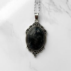 Black Labradorite Pendant Necklace | Antique Silver or Gold | 24" Chain Intuition + Protection + Spiritual Awakening + Clarity Created from the storms of the Northern Lights, Labradorite is known as the "Stone of Transformation". Black Labradorite is a specific type of labradorite known for its powerful spiritual and protective properties. It can be used to protect one's aura and repel negative energy or spells. Black Labradorite activates the crown and third eye chakras, and facilitates a conne Black Round Pendant Necklace For Memorial, Handmade Black Jewelry For Memorial, Black Labradorite Spiritual Necklaces, Black Labradorite Jewelry For Gift, Black Labradorite Pendant Necklace, Protecting Energy, Protection Spiritual, Psychic Ability, The Poison