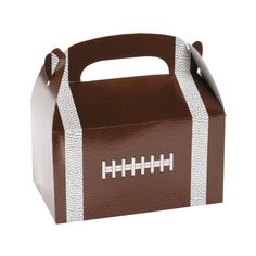 a brown and white football treat box