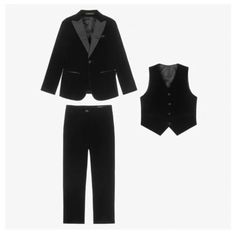 Black Velvet Evening And Special Occasion Suit By Romano. It Is Beautifully Tailored In Plush Velvet, With Satin Lapels, Covered Buttons And A Faux Pocket Square. The Trousers Have A Button And Zip Fastening, And A Part-Elasticated Waist. Size 1 (1-1.5 Years Old) Product Number 102335 70% Polyester, 30% Viscose (Soft Velvet) Lining: 100% Polyester (Soft & Silky) Dry Clean Zip & Button Fastenings Waistcoat: Adjustable Strap On The Back Lining May Vary Large Fitting Set Contains: Jacket, Waistcoat Black Tuxedo Set For Winter, Classic Black Winter Set, Black Velvet Suit, Velvet Suit, Luxury Collection, Soft Velvet, Waist Size, Covered Buttons, Pocket Square