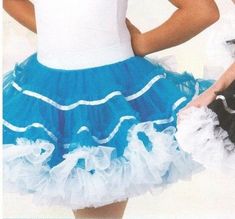 This is a brand new  dance costume skirt in turquoise and white, ladies small adult, ladies large adult or child medium (that is the only 2 sizes I have) you do not get the leotard shown on the model. It is a 2 layer heavily ruffled skirt. The topskirt is a tiered and ruffled organdy with white satin ribbon trim. The waistband is a white 2 inch elastic with a ton of stretch.The manufacturer is Main Street Dancewear (a division of Wolff Fording) so you know the quality is exce Dance Petticoat With Ruffles And Stretch, Stretch Petticoat With Ruffles For Dance, Summer Dance Petticoat With Attached Cancan, Summer Petticoat With Attached Cancan For Dance, Fitted Dance Petticoat, Summer Dance Fitted Petticoat, Fitted Petticoat With Attached Cancan For Dance, White Fitted Petticoat For Dance, Fitted Blue Skirt With Attached Cancan