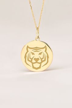 If you wish we can personalize your 14k Solid Gold Tiger Necklace. A Dainty and unique gift for Birthdays, Graduations, Weddings and Anniversaries. ● MATERIAL 14k SOLID GOLD ● Chain Length or Without Chain - Without Chain - 40 cm / 16 inches - 45 cm / 18 inches - 50 cm / 20 inches ● PENDANT SIZE [The jump ring (bail) is not included in the measurements] - 13 mm / 0.51 Inches diameter - 14 mm / 0.55 Inches diameter - 15.3mm / 0.6 Inches diameter - 16.5mm / 0.65 Inches diameter - 19 mm / 0.75 Inch Yellow Gold Charm Necklace As A Gift, Gold Jewelry With Certificate As A Gift, Gold Jewelry With Certificate For Gift, Customizable Yellow Gold Necklace Gift, Custom Yellow Gold Necklace With Polished Finish For Gift, Custom Yellow Gold Necklace With Polished Finish As Gift, Yellow Gold Jewelry Gift, Engraved Yellow Gold Charm Necklaces As Birthday Gift, Engraved Yellow Gold Charm Necklace For Birthday