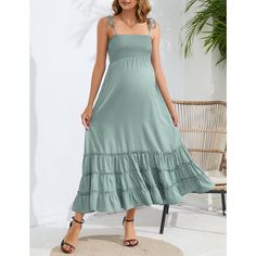 Elevate your maternity wardrobe with the WhizMax Sleeveless Maternity Dress, a perfect blend of style and comfort for any expectant mother. This flowy maxi dress features a delicate sage green hue and is crafted to flatter your figure at every stage of pregnancy and beyond.

- Material: Lightweight and breathable fabric
- Color: Sage Green
- Size: XXL
- Gender: Female
- Features: Spaghetti straps, smocked bodice, tiered design

Ideal for baby showers, photoshoots, or casual outings, this versati Baby Shower Photoshoot, Dress For Baby Shower, Shower Photoshoot, Sage Green Maxi Dress, Female Features, Maternity Wrap Dress, Long Sleeve Maternity Dress, Maternity Long Dress, Summer Spaghetti