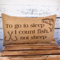 a pillow that says to go to sleep i count fish, not sheep