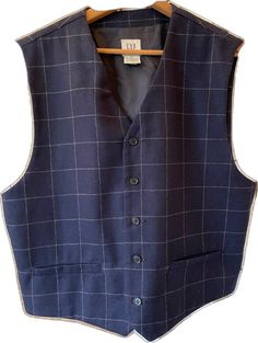 Navy Blue Vest Coat For Men, Classic Navy Sleeveless Vest, Blue Wool Vest For Winter, Classic Navy Winter Vest, Navy Fitted Winter Vest, Navy Fitted Vest For Winter, Navy Fitted Vest For Fall, Classic Blue Winter Vest, Tailored Blue Vest For Fall