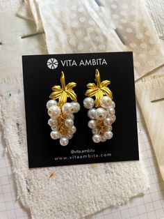 These vintage-style gold plated earrings feature a stunning bunch of pearls that will elevate any outfit, adding a touch of sophistication and elegance. Perfect for any occasion, these earrings are a must-have for anyone seeking to make a statement. Pearls Earrings, Gold Plated Earrings, Vintage Style, Pearl Earrings, Gold Plate, Vintage Fashion, Plating, Gold