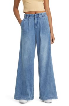 Make a statement in these pleated, vintage-inspired jeans fashioned with trouser-style pockets and superwide legs that sway with every step. 32" inseam; 30" leg opening; 11 1/2" front rise; 15 1/2" back rise Zip fly with button closure Side slant pockets 63% cotton, 27% polyester, 8% rayon, 2% spandex Machine wash, tumble dry Imported Super Wide Leg Jeans, Trouser Style, Wide Leg Jeans, Jeans Style, Leg Jeans, Vintage Inspired, Top Brands, High Waist, Wide Leg