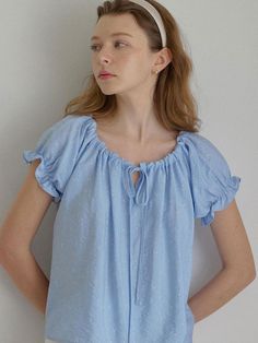 This is a trendy and feminine top by LETTER FROM MOON that is made out of high quality and sturdy material. With distinctive mood of the design and comfortable wear, you can style it for your casual daily outfit.- Lovely flower pattern on the fabric- Adjustable neck string for natural shirring- Feminine and casual mood Spring Puff Sleeve Tops For Loungewear, Chic Floral Print Blouse For Loungewear, Chic Blouse With Floral Print For Loungewear, Casual Puff Sleeve Tops For Loungewear, Casual Puff Sleeve Loungewear Tops, Floral Print Puff Sleeve Tops For Daywear, Short Sleeve Blouse With Floral Print For Loungewear, Casual Spring Loungewear Blouse, Blue Feminine Tops For Daywear