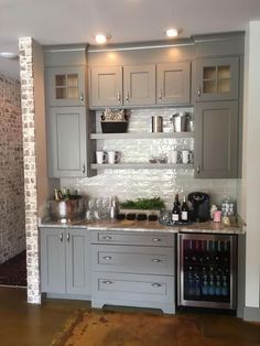 the kitchen is clean and ready to be used for wine tasting or as an entertaining area