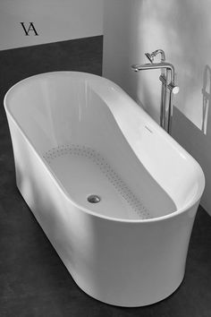 an oval shaped bathtub with the overstock logo on it's back side