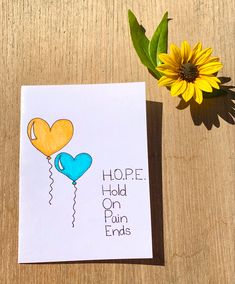 a card with an image of two balloons and a sunflower next to it that says hope hold on fun ends