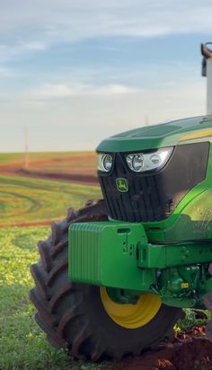 a tractor is parked in the middle of a field