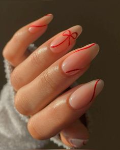 Cute simple bow and ribbon present design. Cute for the holidays Megan Moroney Nails, Minimalist Holiday Nails, Kutek Disney, Red Christmas Nails, Nagel Tips, Christmas Nails Easy, Red Nail, Festival Nails, Xmas Nails