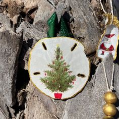 an ornament with a christmas tree on it