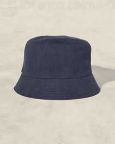 Fun Vintage Washed Cotton Twill Fabric Bucket hat, perfect for summer! One Size Fits Most (60cm) Imported Blue Flat Brim Bucket Hat One Size, Blue Flat Brim Bucket Hat, Navy Bucket Hat With Curved Brim For Summer, Navy Bucket Hat With Curved Brim For Beach, Lightweight Blue Bucket Hat, Navy Curved Brim Bucket Hat For Beach, Blue Flat Brim Bucket Hat For Summer, Blue Lightweight Bucket Hat With Short Brim, Navy Wide Brim Bucket Hat For Summer