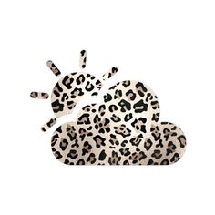 an animal print pattern on the back of a white and black leopard print cloud shaped object