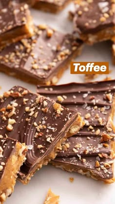 toffee bars with chocolate and nuts on top