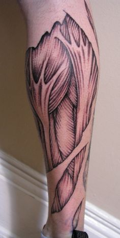 a person with a tattoo on their leg