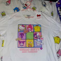 Hello Kitty White Shirt Fun Hello Kitty Print Tops, Cotton Hello Kitty Fun Tops, Fun Cotton Tops With Hello Kitty, Multicolor Cat Print Cotton Tops, Multicolor Hello Kitty Crew Neck Top, Multicolor Hello Kitty Print Short Sleeve Tops, Multicolor Hello Kitty Print Crew Neck Top, Kawaii Cotton Shirt With Character Print, Hello Kitty Graphic Cotton Tee