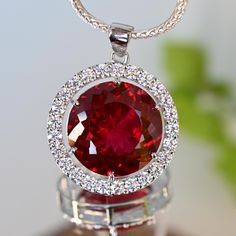 Product Details: --------------------- Gemstone Type: Natural Ruby (Round) Second Stone : Lab Diamond (Round) Pendant Weight: 63 CT (12.06 grams) Pendant  Dimensions: 28 X 28 MM Color: Red  Cut Grade: Excellent Hardness: ≥ 9 Mohs Treatment: Not Enhanced Certification: Included Country of Origin:  Mozambique  Country/Region of Manufacture: India NOTE :- ---------  You will receive the exact product shown in the picture. Shipping Information : -  ----------------------------- Shipping: Free Shippi Sterling Silver Gemstone Necklace, Halo Pendant, Red Gemstones, Gemstone Necklace Pendant, Red Ruby, Natural Ruby, Round Pendant, Natural Red, Lab Diamonds