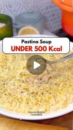 pasta being cooked in a pan with a ladle over it and the words pasta soup under 500 kel