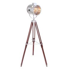 the tripod floor lamp is made out of wood and metal