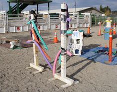 there are many different things in the sand at this beach area, including an obstacle course