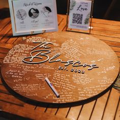 a wooden table with writing on it