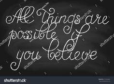 the phrase all things are possible if you believe written in chalk on a blackboard