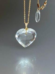 Beautiful Natural Rock Crystal Faceted Heart pendant necklace. The necklace is elegant and perfect to go with any outfit. *AAA Natural Rock Crystal Quartz Faceted Heart Shape *pendant measure: 22X22mm /0.85X 0.85 inch *Metal: 14K gold filled *necklace length: 45 cm /18 inch Solid gold, silver, and gemstones are also my materials of choice, I love working with these beautiful natural gems and hope that you will love the jewelry pieces that I make. FREE GIFT BOX INCLUDED All my items arrive in a p Clear Crystal Necklace, Gold Jewelry Gift, Christmas Gifts For Girlfriend, Topaz Jewelry