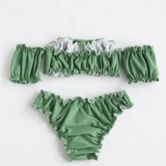 Never Used, Girls Drawstring Front Lettuce Trim Bikini Swimsuit. Green Off Shoulder Ruched Frill, High Stretch Bikini. Size: 13-14y (160) Green Ruffles Swimwear For Poolside, Green Bandeau Tankini With Stretch, Green Bandeau Stretch Tankini, Green Stretch Bandeau Tankini, Green Ruffled Swimwear For The Pool, Green Ruffled Swimwear For Sunbathing, Green Ruffled Swimwear For Beach Season, Green Stretch Bandeau Swimwear, Fitted Green Ruffled Swimwear