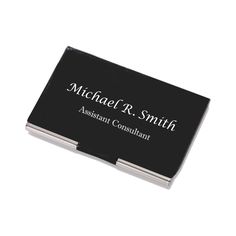 a black business card holder with the name michael r smith on it