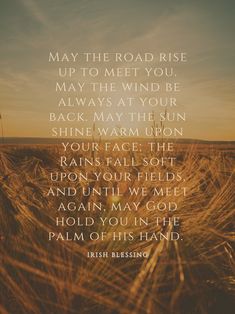 a field with the words, may the road rise up to meet you maybe the wind