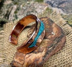 * Waved Turquoise Inlay Copper Cuff Bracelet. * King Man Turquoise Used. * Polished and Waxed. * Measure your Whole Wrist and Mark it on the Option. Turquoise Patina Cuff Bracelet As A Gift, Turquoise Cuff Bracelet With Patina As A Gift, Turquoise Bracelet With Patina As A Gift, Turquoise Wedding Rings, Turquoise Wedding, Copper Cuff Bracelet, Kings Man, Copper Cuff, Copper Rings