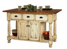 an old style kitchen island with two drawers