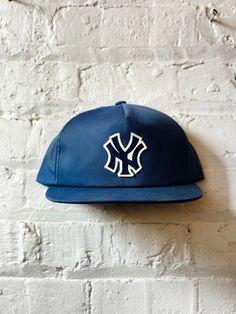 "Vintage New York Yankees Hat - (New) Cotton Unstructured 5 Panel Snapback in Navy - (New) Cotton Unstructured 5 Panel Snapback in Charcoal Closure - 7 Button Plastic Snap Color - Navy & Charcoal Contents - 60% Cotton / 40% Polyester Profile - 3.25\" Size - One Size Fits All (6 ⅝\" - 7 ⅝\") Structure - Lightly Structured - Flocked Yankees Patch" Vintage Yankees, New York Yankees Hat, Hat New York, New York Hat, Ny Hat, New York Yankee Hat, Yankees Hat, New York Vintage, Vintage Cap