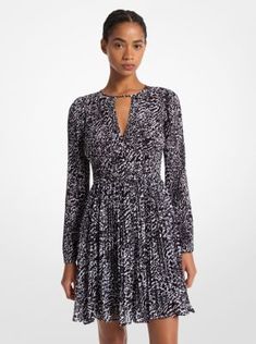 A feminine silhouette and graphic ocelot-inspired print come together on this eye-catching dress. Crafted in lightweight georgette, it features a cutout at the neckline, fitted bodice, and pleated skirt that adds movement with every step. Michael Kors Dress, Georgette Dress, Feminine Silhouette, Michael Kors Dresses, Polyester Dress, Fitted Bodice, Gorgeous Dresses, Pleated Skirt, Beautiful Dresses