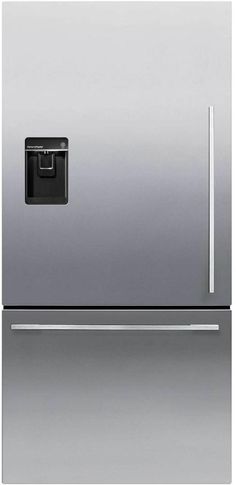 a silver refrigerator freezer sitting on top of a counter