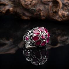 Ottoman Ruby Silver Ring Traditional Turkish Handmade Jewelry - Material: 925 Sterling Silver - Stone Type: Ruby - Ring Top Dimensions: 20 x 20 mm - Average Weight: 20 gr. (depends on your ring size) Check for more handmade traditional jewelry: https://www.etsy.com/shop/GrandBazaarExclusive  Shipping via DHL Express by The Grand Bazaar Istanbul. Delivery Takes 1-3 days to any worldwide location. Shipping is free of charge. FOR MORE HANDMADE JEWELRY VISIT: https://www.etsy.com/shop/GrandBazaarExc Traditional Sterling Silver Ruby Ring Gift, Traditional Sterling Silver Ruby Ring, Traditional Silver Ruby Ring Gift, Traditional Silver Ruby Ring As Gift, Silver Signet Ring With Ruby For Gift, Traditional Silver Ruby Ring For Anniversary, Heirloom Silver Ruby Ring, Ruby Silver Ring, Bazaar Istanbul