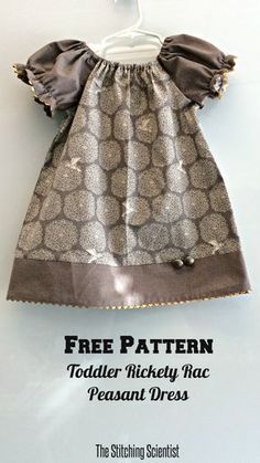 a baby dress made out of fabric with the words free pattern toddler's kitchen fac peasant dress