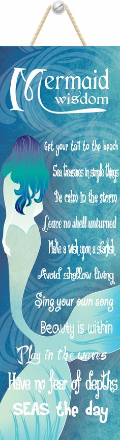 a mermaid poster hanging on a wall with the words mermaid vision written in blue and white