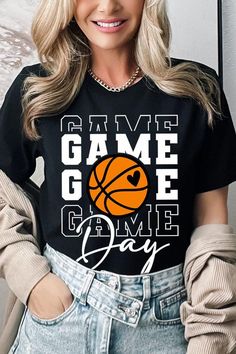 a woman wearing a black shirt that says game day with a basketball ball on it