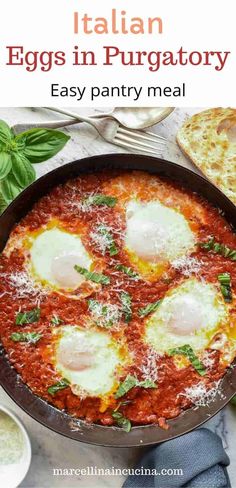 an egg dish in a pan with parmesan cheese and basil on the side