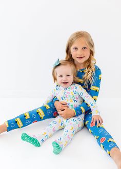 Be silly and never grow up. Our School Bus Super Soft Bamboo Footie for kids is here! The perfect blend of comfort and sustainability. Made from 95% organic bamboo fabric, these pajamas are incredibly soft, breathable, and gentle on your child's skin. Our fabric is hypoallergenic, making it an excellent choice for kids with sensitive skin. These pajamas are machine washable and maintain their softness even after multiple washes. Content + Care 95% Bamboo, 5% Spandex Machine wash cold, tumble dry Mermaid Pajamas, Window Writing, Animal Pajamas, Be Silly, Cozy Pajamas, Never Grow Up, Bamboo Fabric, School Bus, Animal Party