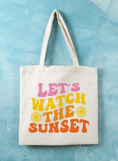 "Groovy \"Let's Watch the Sunset\" tote bag Totes for School, beach or shopping. Also great for day care and the library!  These handmade, reusable 15\" x 16\" canvas totes are carefully hand-made by me just for you. These bags are super durable and big enough to carry a lunch box, towel or other belongings. Great for the beach! This multipurpose canvas tote bags comes in multiple color options and is ideal for school or office work, grocery shopping, a park of beach visit and other daily activi Beach Season Vacation Canvas Bag With Adjustable Strap, Beach Season Canvas Bag With Adjustable Strap, Cute Travel Shoulder Bag With Letter Print, Cute Letter Print Shoulder Bag For Travel, Summer Canvas Bag With Adjustable Strap, Summer Canvas Shoulder Bag With Letter Print, Trendy Canvas Shoulder Bag For Beach Season, Casual Beach Shoulder Bag With Letter Print, Trendy Letter Print Beach Bag For Travel