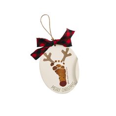 a christmas ornament with a red and black ribbon