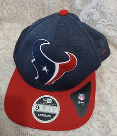 a new era hat with the houston texans on it