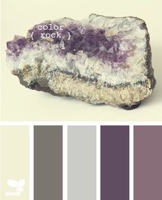 a rock with purple and grey colors on it, including the words color rock written in white