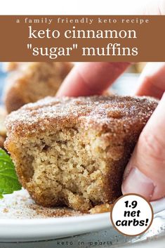 a close up of a muffin on a plate with the words keto cinnamon sugar muffins